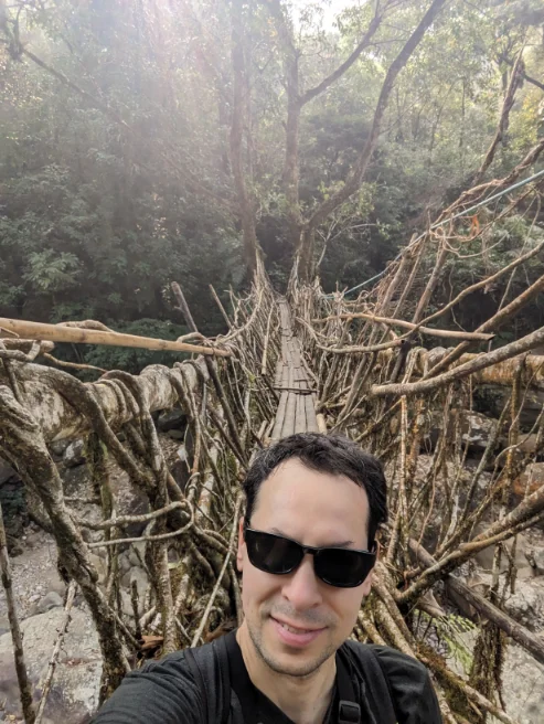 Me, in front of a single root tree bridge