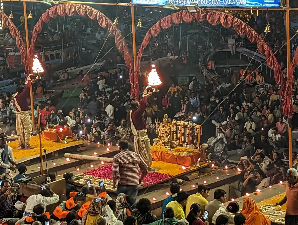 Priest entertainment at evening prayer in Varanasi, the Ganges River