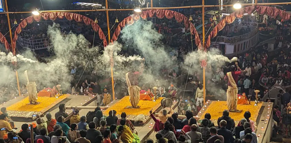 Smoke and priests at evening prayer in Varanasi, the Ganges River