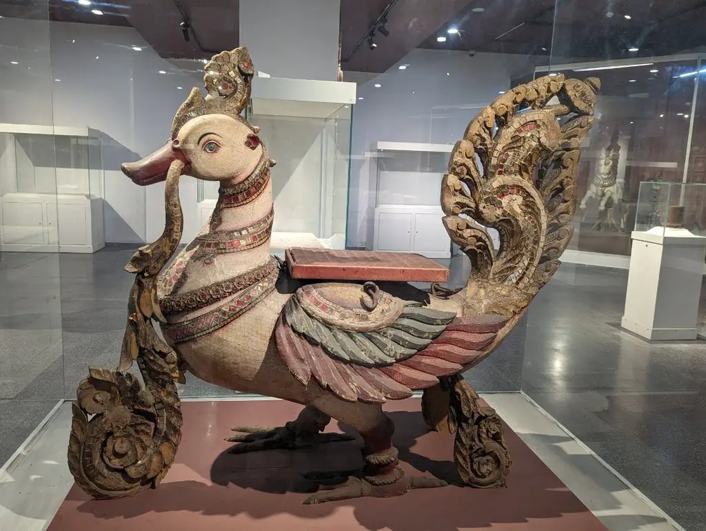 Carved wood into a peacock, national museum delhi india